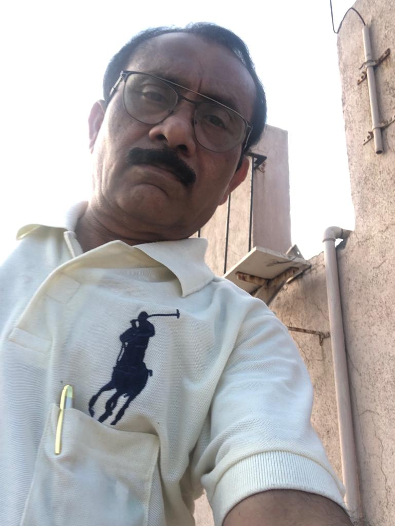 Dr P K Surti